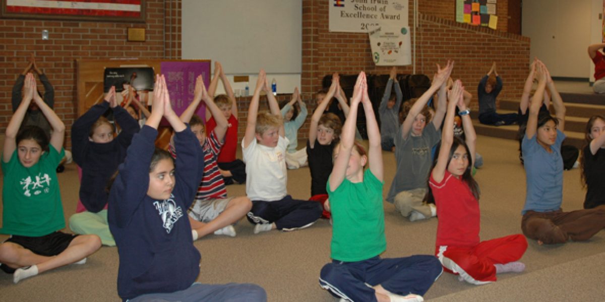 Ahimsa seated hands in air